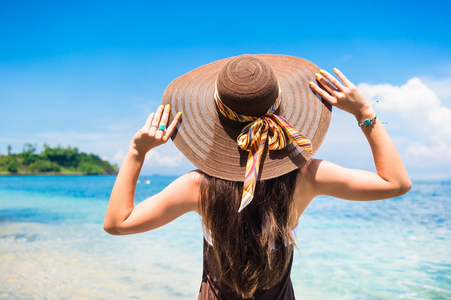 Photo of woman with hat in Corfu Beach